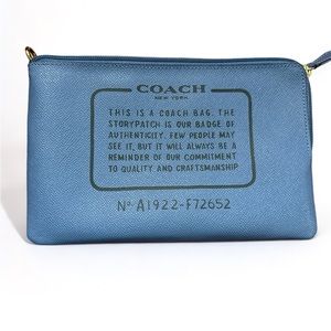 Coach small blue leather clutch